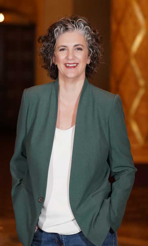 Portrait of Carrie Wright wearing business casual attire.