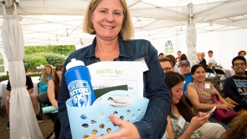 Woman holding a goodie basket 