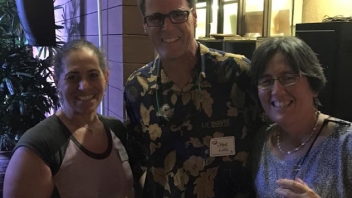 Three people smiling 