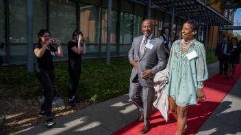 Chancellor Gary May and LeShelle May walking down the red carpet.