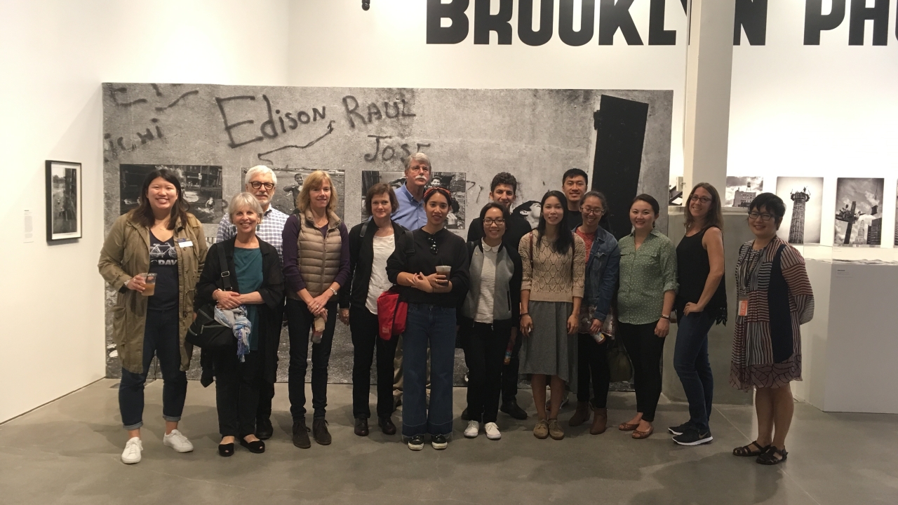 New York Aggies tour BRIC Media Center with renowned public artist and fellow UC Davis alumna and philanthropist, Jackie Chang. New York Aggies posing in BRIC Media Center