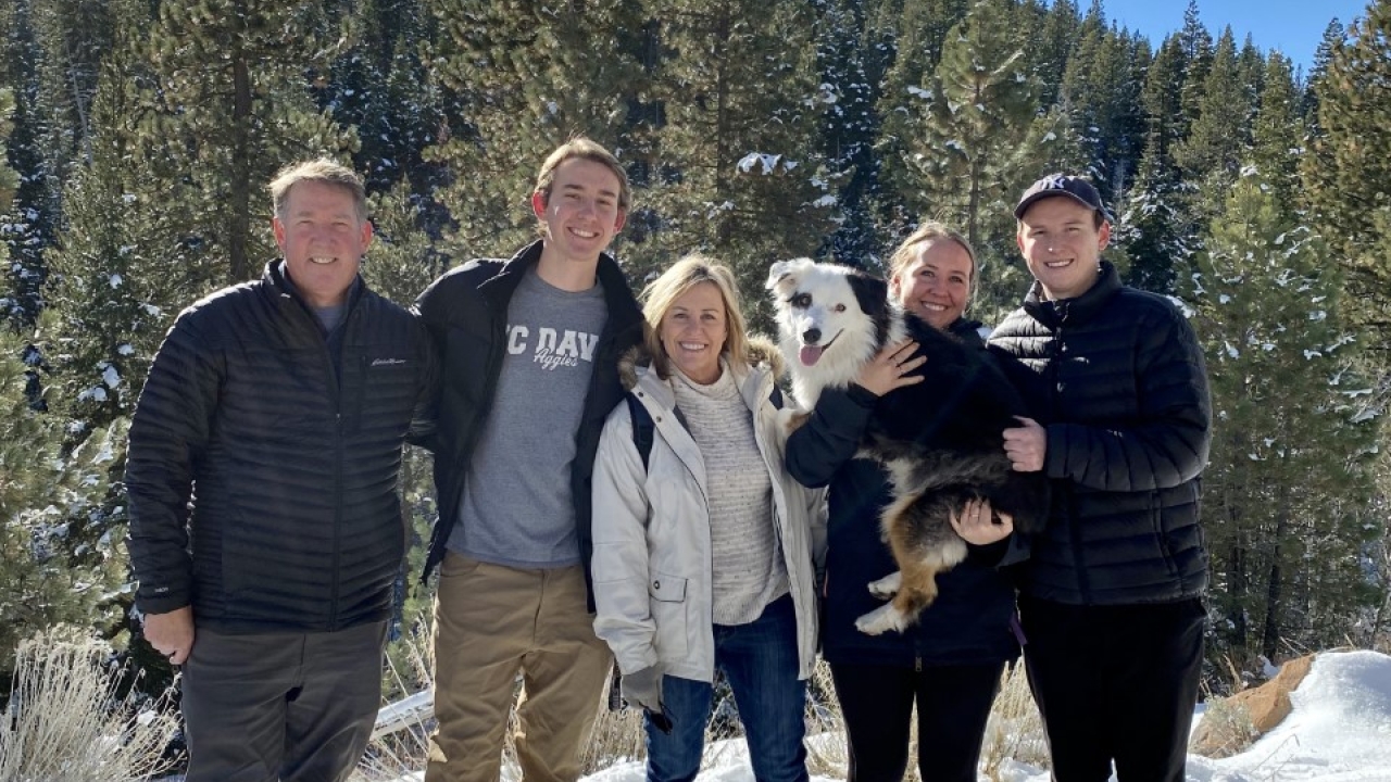 Family standing outdoors