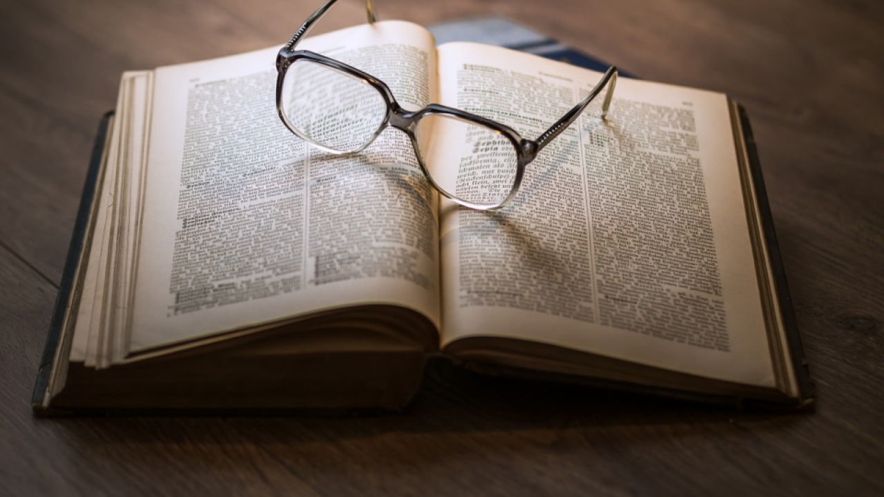 eye glasses on a book
