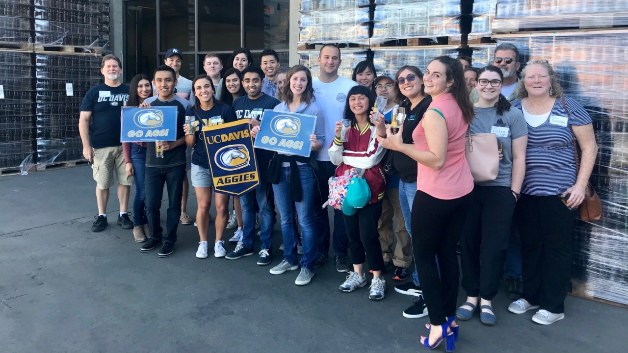 Group of alumni and friends at the 2017 Gordon Biersch Brewery Tour