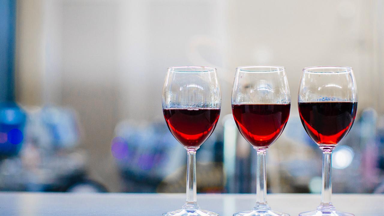Photo of three glasses of red wine