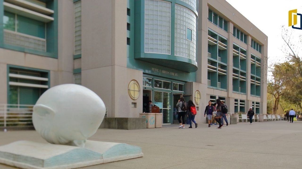 entrance to the Shields Library with egg head in picture