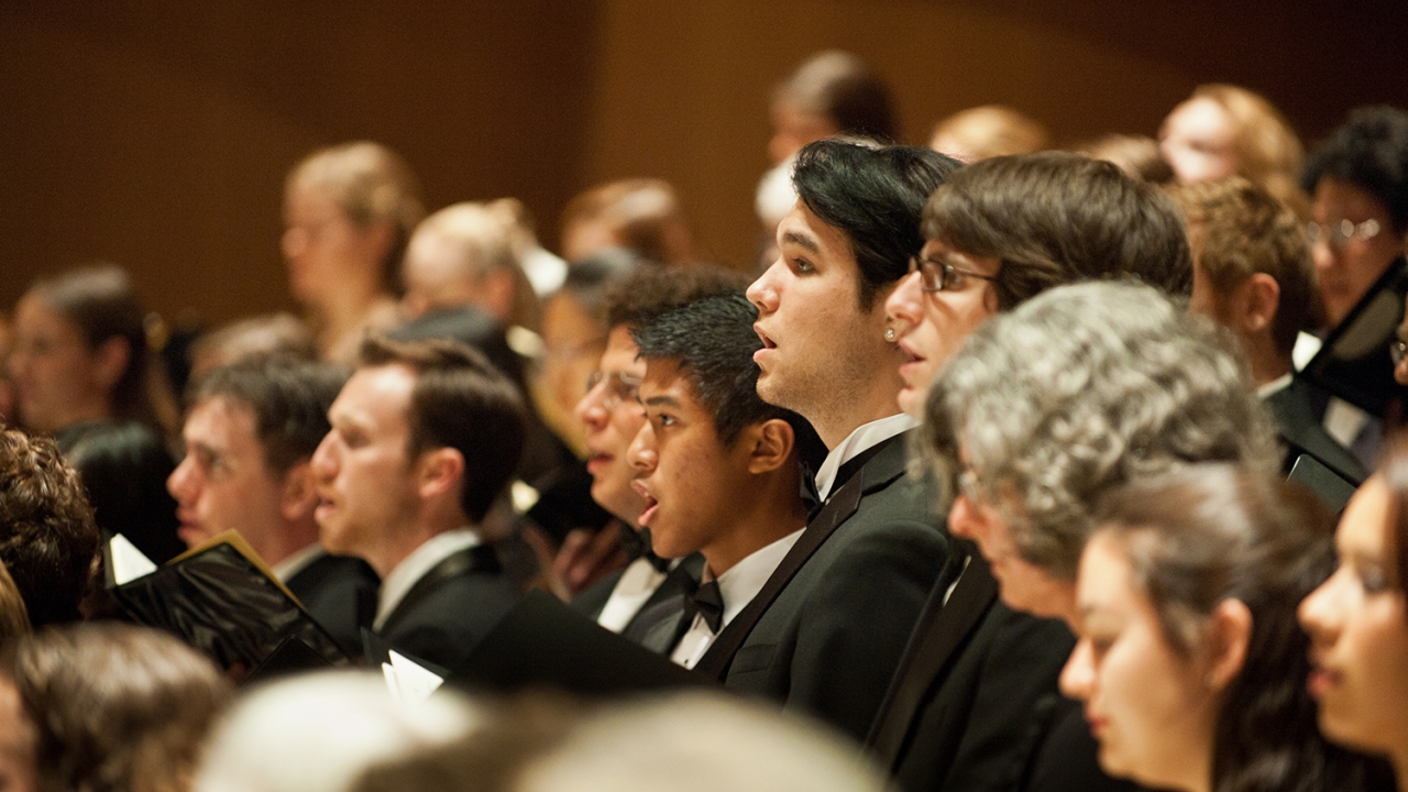 Chorus members singing