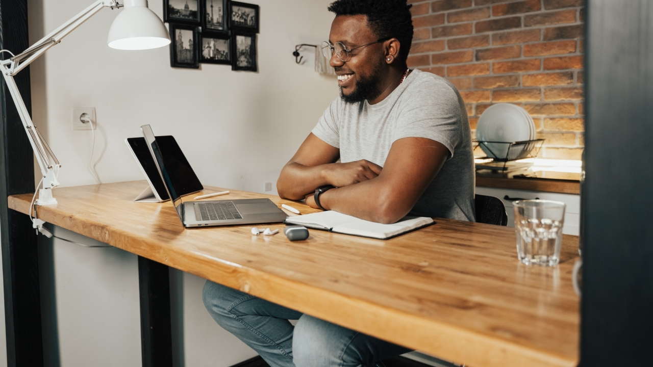 Image of man working at his laptop