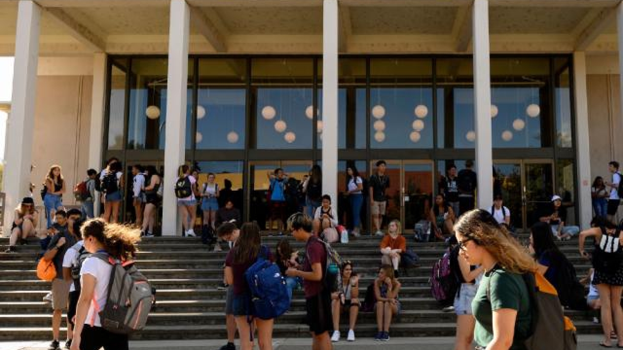 students standing outside of rock hall at UC Davis