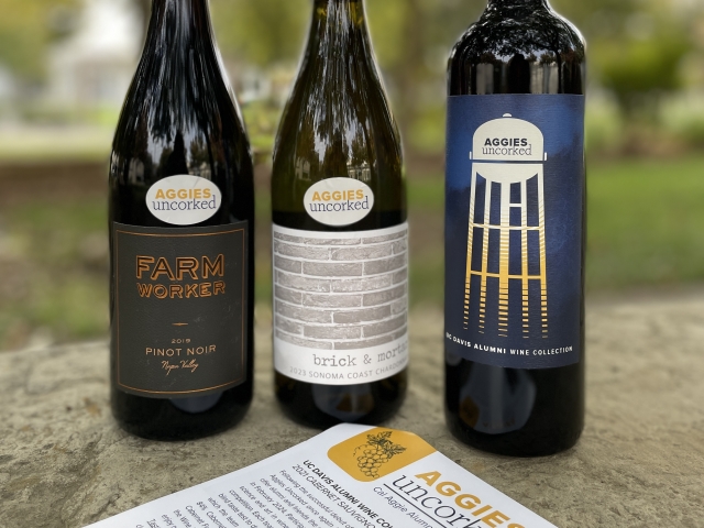 Display of wine bottles for UC Davis Aggies Uncorked Alumni Wine Club