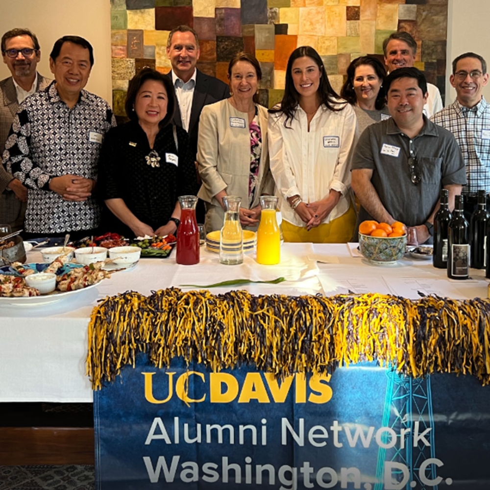 group of uc davis alumni at networking event