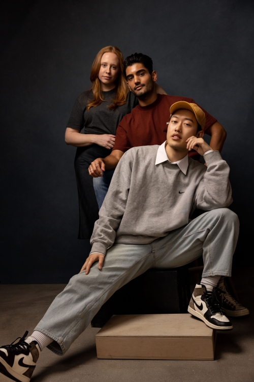 Davis Suh, Rick Bhatia, and Megan Frantz pose together for a photo. 