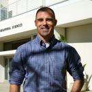 Richard Addante in front of a building