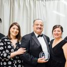 UC Davis Alumni Award honoree Francisco Rodriguez poses with family at Betty Irene Moore Hall School of Nursing