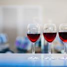 Photo of three glasses of red wine