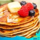 image of a stack of pancakes with butter and berries. Logo for the Robert Mondavi Institute for Wine and Food Science