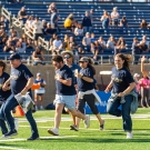 group of alumni running 