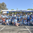 Picnic Day Parade participants in front of their decorated tram