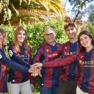 David with his family wearing matching sports jerseys with the Marcos Automoción logo.