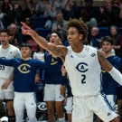 Men's basketball team celebrating