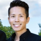 Headshot of Ricky Koo posing outdoors in a dark blue button-down shirt.