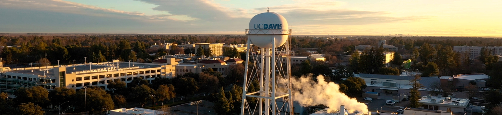 Aerial shot of UC Davis water tower. Campus is visible in the surroundings.